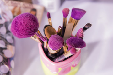 Colorful brush on pink color