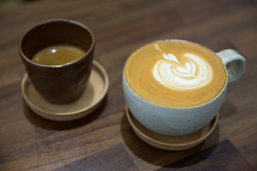 Coffee on wood table in coffee shop