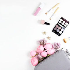 Beauty blog concept flat lay. Fashion accessories, flowers, cosmetics, jewelry, copyspace.