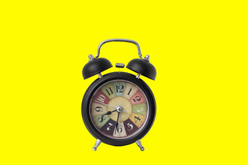 clock on yellow background