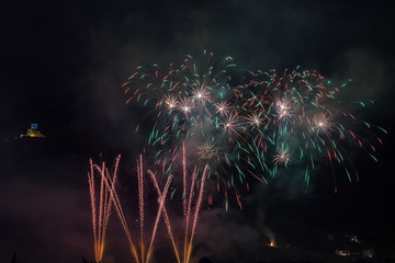 Wonderful and colorful fireworks fountains on the feast of the patron saint of the city whose...