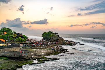 Sunset at Tanah Lot Temple on Sea in Bali Island