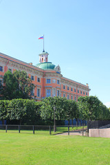 Fototapeta na wymiar Saint Michael's Castle (Mikhailovsky or Engineers' Castle) in St. Petersburg, Russia. Old Historical Palace with Russian Museum's Art Collections, Outdoor Exterior View of Building Facade from Park