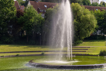 A fountain in a public park of a big German city