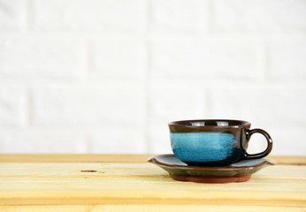 coffee cup on the wood table copy space for your text
