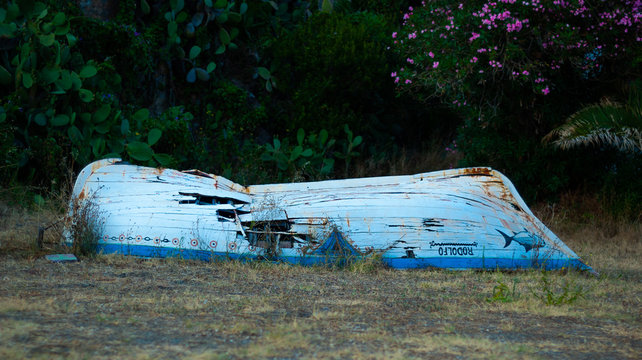 Old broken boat on Scalea beach