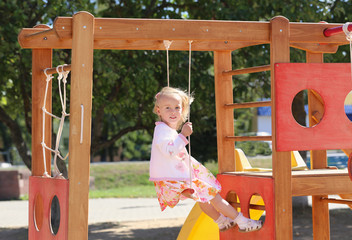 happy little girl on playground