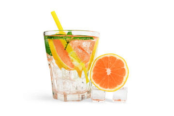 glass of soda water with ice cubes, grapefruit and mint. Isolate on white background