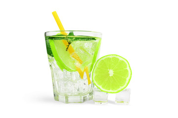 glass of soda water with ice cubes, lime and mint. Isolate on white background