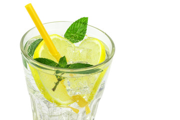 lemonade with ice mint, lemon and pipe for drinking