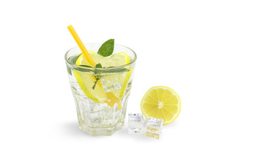 lemonade with ice mint, lemon and pipes for drinking, half a lemon and ice