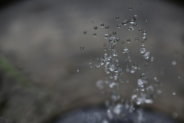 A closeup on the spray from a fountain