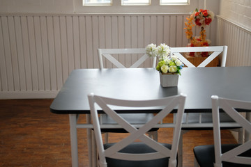 table & chair set in cozy dining room interior