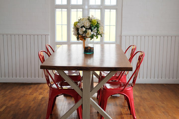 table & chair set in cozy dining room interior