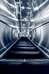 Obraz premium Escalator in the city leading to the underground passage of the subway
