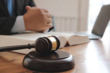 judge with legal law gavel & book at courtroom. lawyer attorney justice