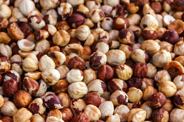 Nut background of hazelnut fruits. Food background. Top view of hazelnut nuts.