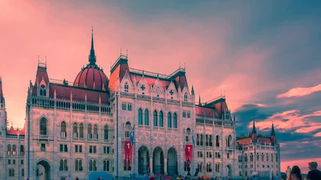 Parliament of Budapest at sunset. Time lapse. Zoom out effect 