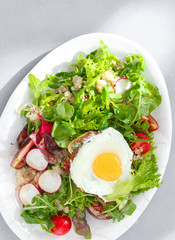 Plate fresh salad quinoa fried egg Healthy food clean eating