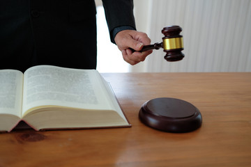 judge with gavel & legal law book at courtroom. lawyer attorney justice