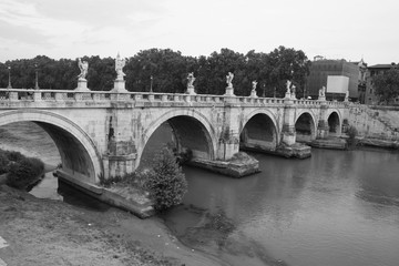 Fototapeta premium Bridge Ponte Sant'Angelo over the Tiber river,Rome, Italy