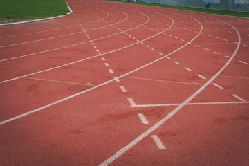 lane number & running racetrack, backstretch in outdoor sports stadium arena