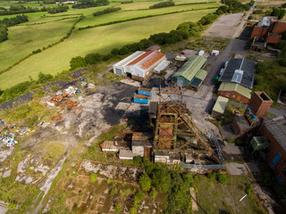 Aerial drone view of a closed, abandoned coal mine (Tower Colliery, South Wales)