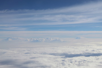 Tiny distant plane seen from another plane