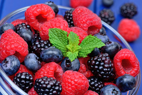 Healthy mixed fruit and ingredients with raspberry, blueberry, blackberry