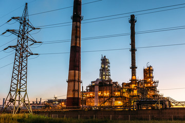 Oil refinery plant with many pipes and chimneys, industrial petrochemical fuel and gas production