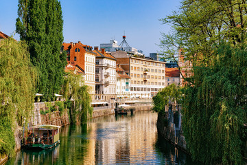 Fototapeta na wymiar Riverside of Ljubljanica River in historical center of Ljubljana