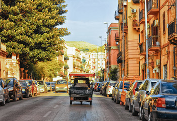 Fototapeta na wymiar Rickshaw in street on road in Palermo