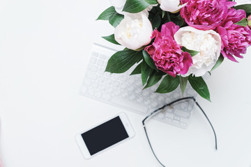 Work place mobile phone keyboard glasses pink peony