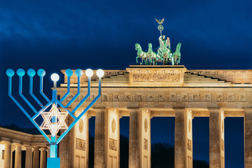 Hanukkah Menorah at Brandenburg Gate Building in Berlin © Roman Babakin