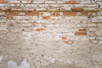 Old weathered brick wall background.Horizontal color photography.