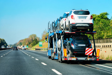 New car carrier in road