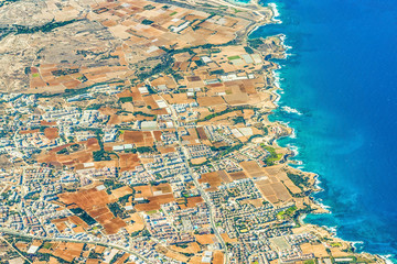 A small resort town in the north of Cyprus. View from the plane.