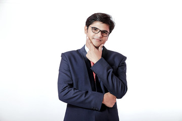 Young Indian businessman over white background