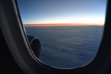 Naklejka premium Sonnenaufgang aus dem Flugzeug
