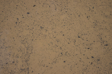 Dirty contaminated brown water background.
