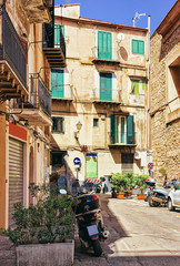 Fototapeta na wymiar Scooter at the street of Monreale town Sicily Europe