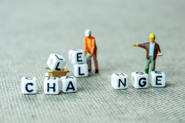 Removing white cubes with letters l and e of the word challenge creating new word change on white...