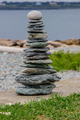 A pile of rocks stacked on one another resembling a Christmas Tree