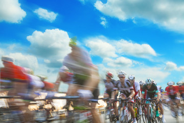 Fototapeta premium Group of cyclist during a race, motion blur