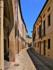 A cloistered pavement in a shopping area of Treviso Italy