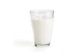 Glass of the fresh milk on a white background
