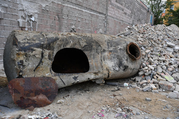 An old, rusty earth tank on a construction site in Berlin Germany. 