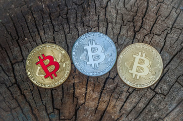 bitcoin monet. new currency in modern business world concept On a wooden texture.