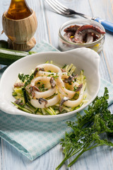 rings squid with zucchinis and anchovies