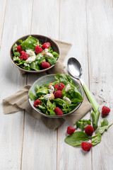 mixed salad with valerian raspberries and cheese